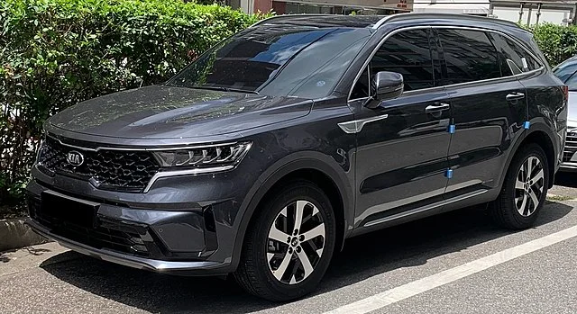 Grey Kia Sorento parked outside