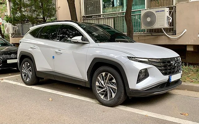 White 2023 Hyundai Tucson on a street