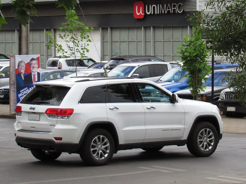 White Jeep in a parking lot