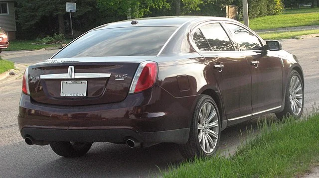 Rear bumper of a red Lincoln MKS