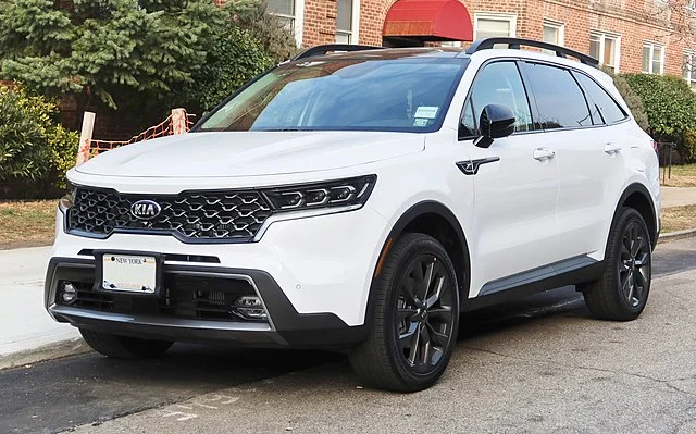 White Kia Sorento parked outside