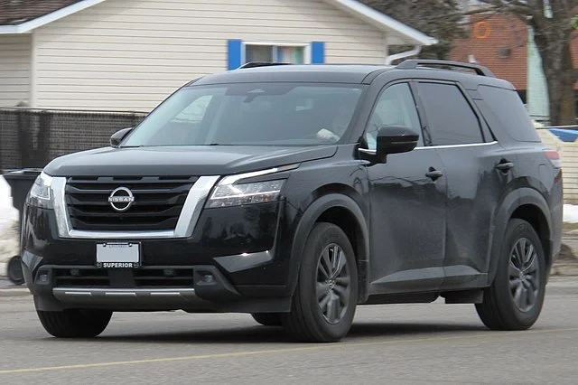 Black Nissan Pathfinder on a road