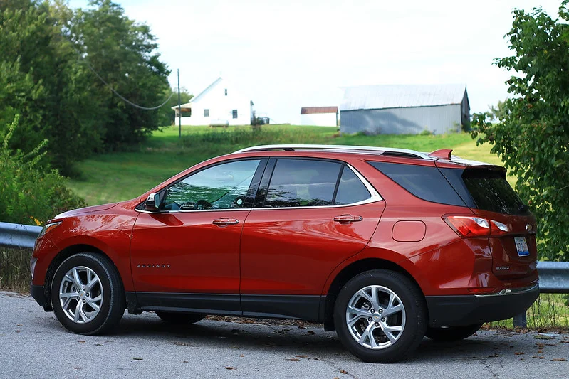 Red 2018 Chevy Equinox parked outside