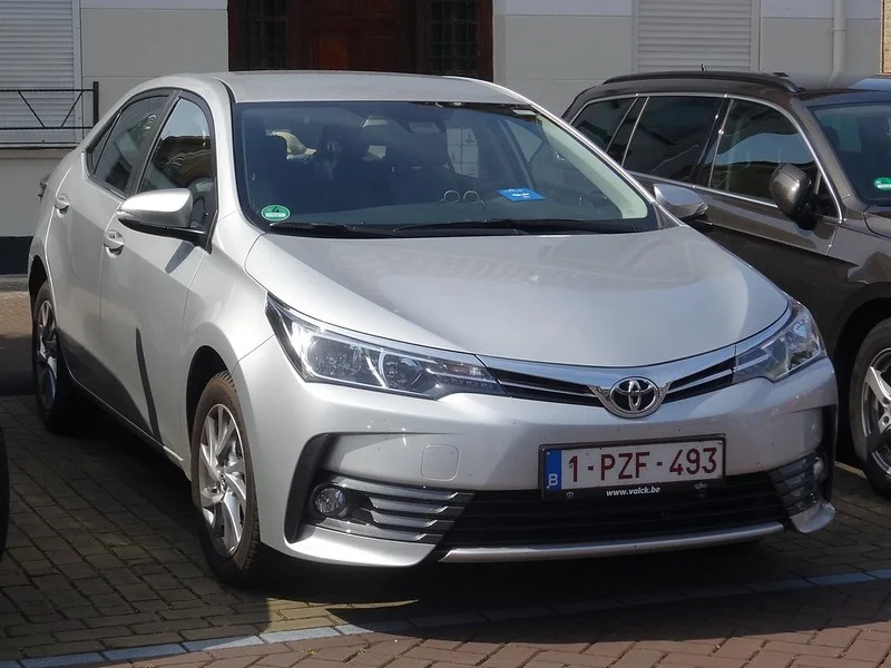 Silver Toyota Corolla in a parking lot