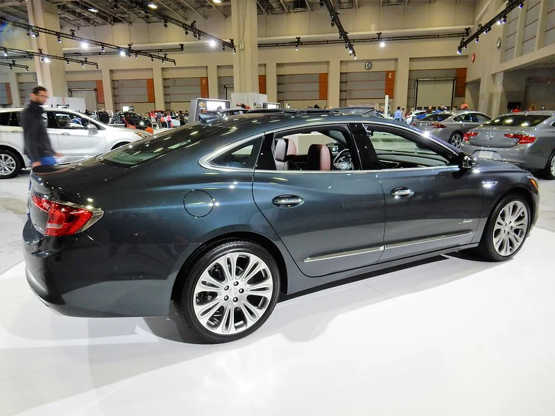 Black Buick LaCrosse in a showroom