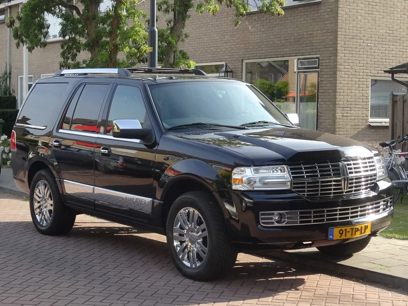 Black Lincoln Navigator parked on a street