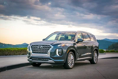 Hyundai Palisade parked outside at sunset