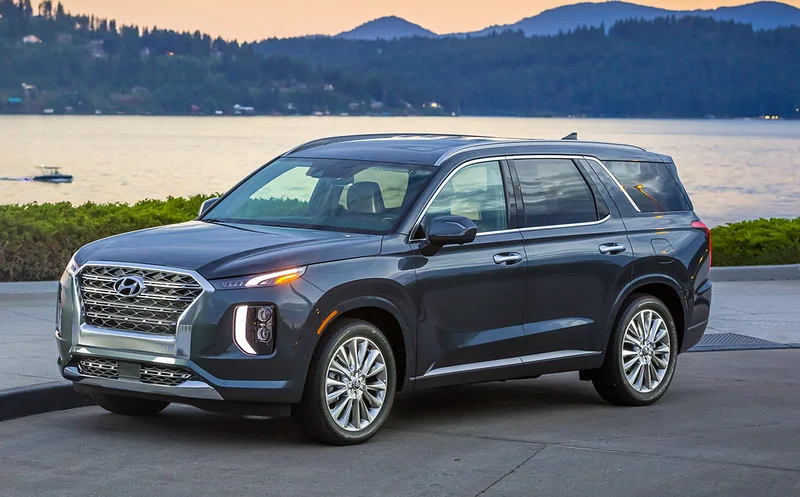 Hyundai Palisade parked next to a lake