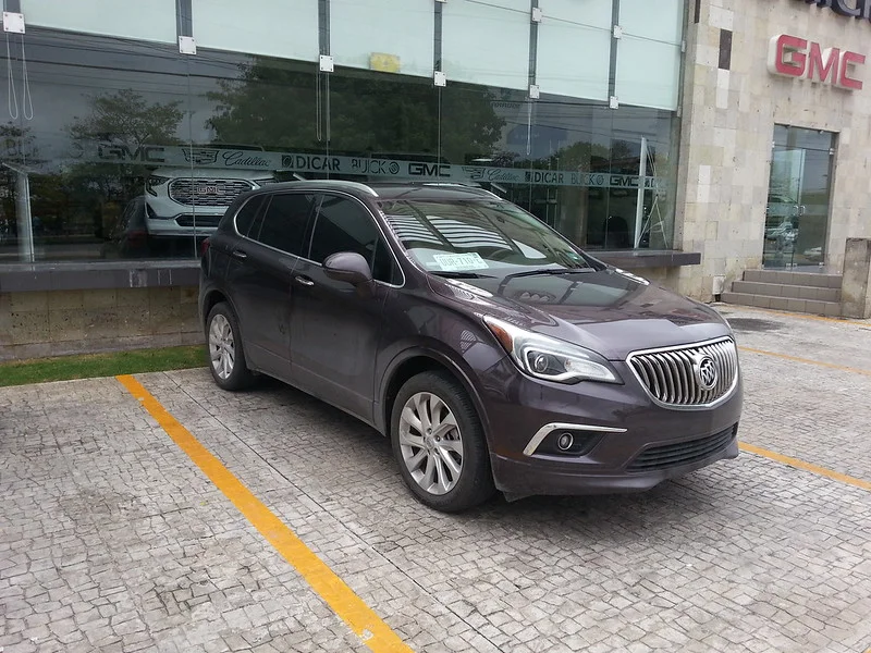 Purple Buick Envision in a parking lot