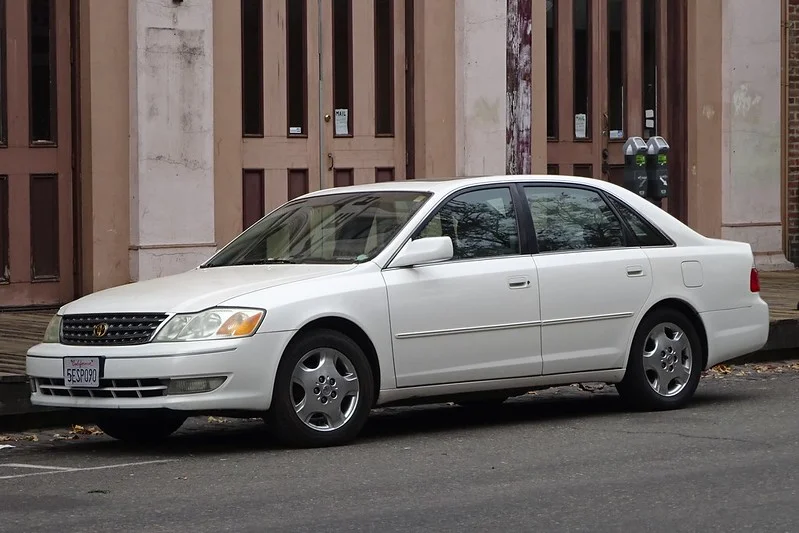 White Toyota Avalon parked on a street