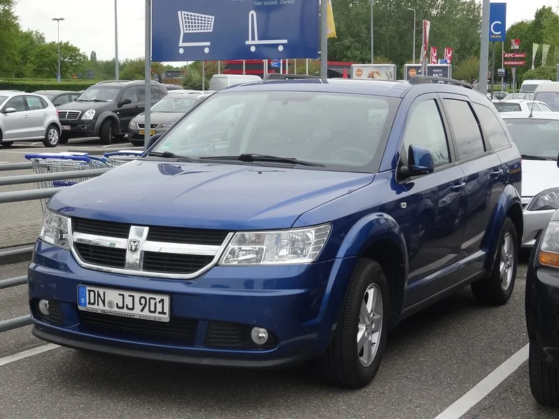 Blue Dodge Journey in a parking lot