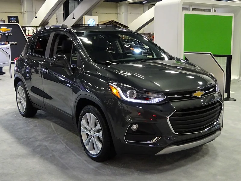 Black Chevy Trax in a showroom