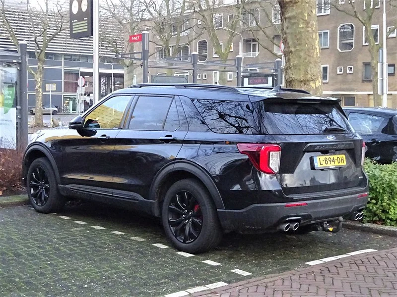 Black 2021 Ford Explorer parked in a brick lot