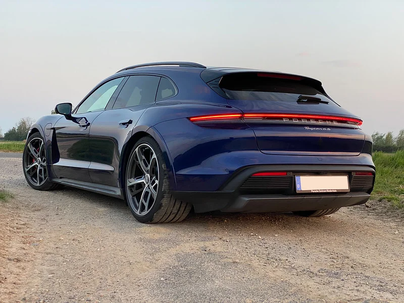 Porsche Taycan in a field