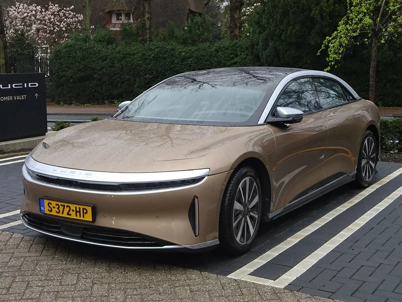 Tan Lucid Air in a parking lot