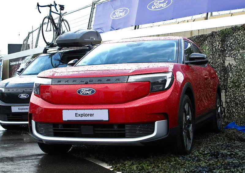 Red Ford Explorers parked outside