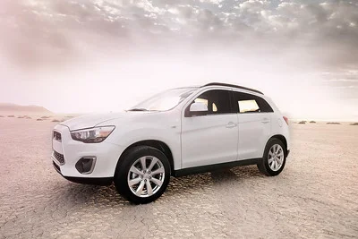 White Mitsubishi Outlander Sport in the desert