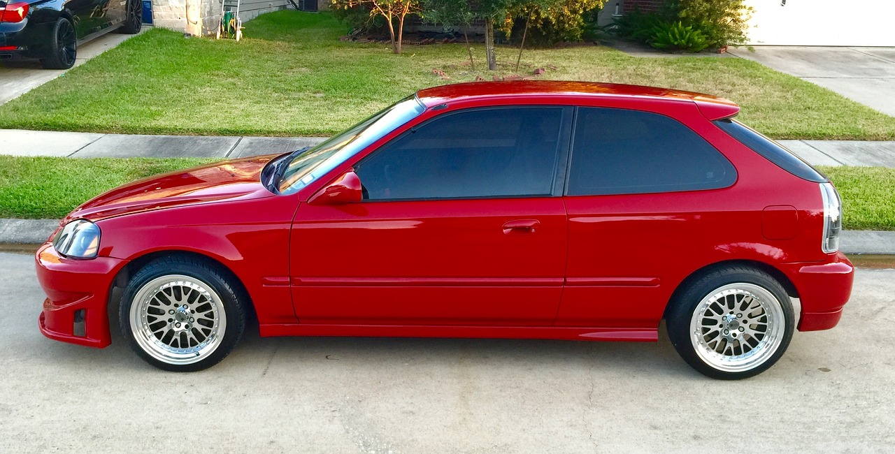 Red Honda Civic parked on a street