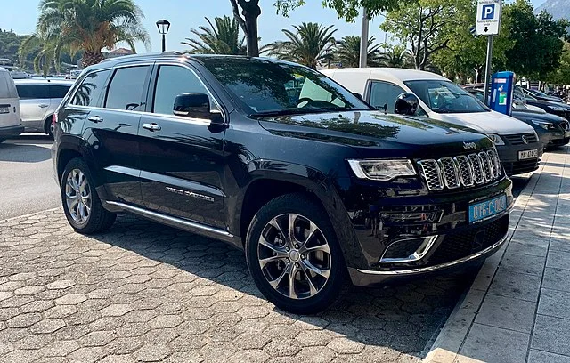 Black Jeep Grand Cherokee in a car lot