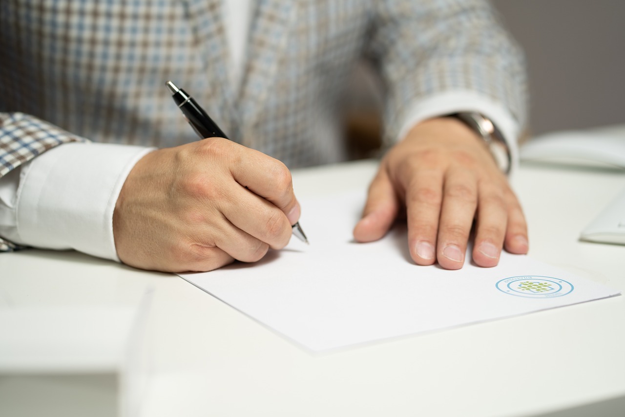 Man filling out paperwork