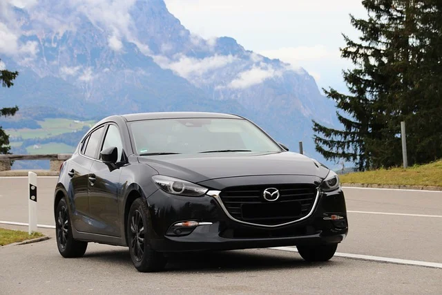 Black Mazda3 in the mountains