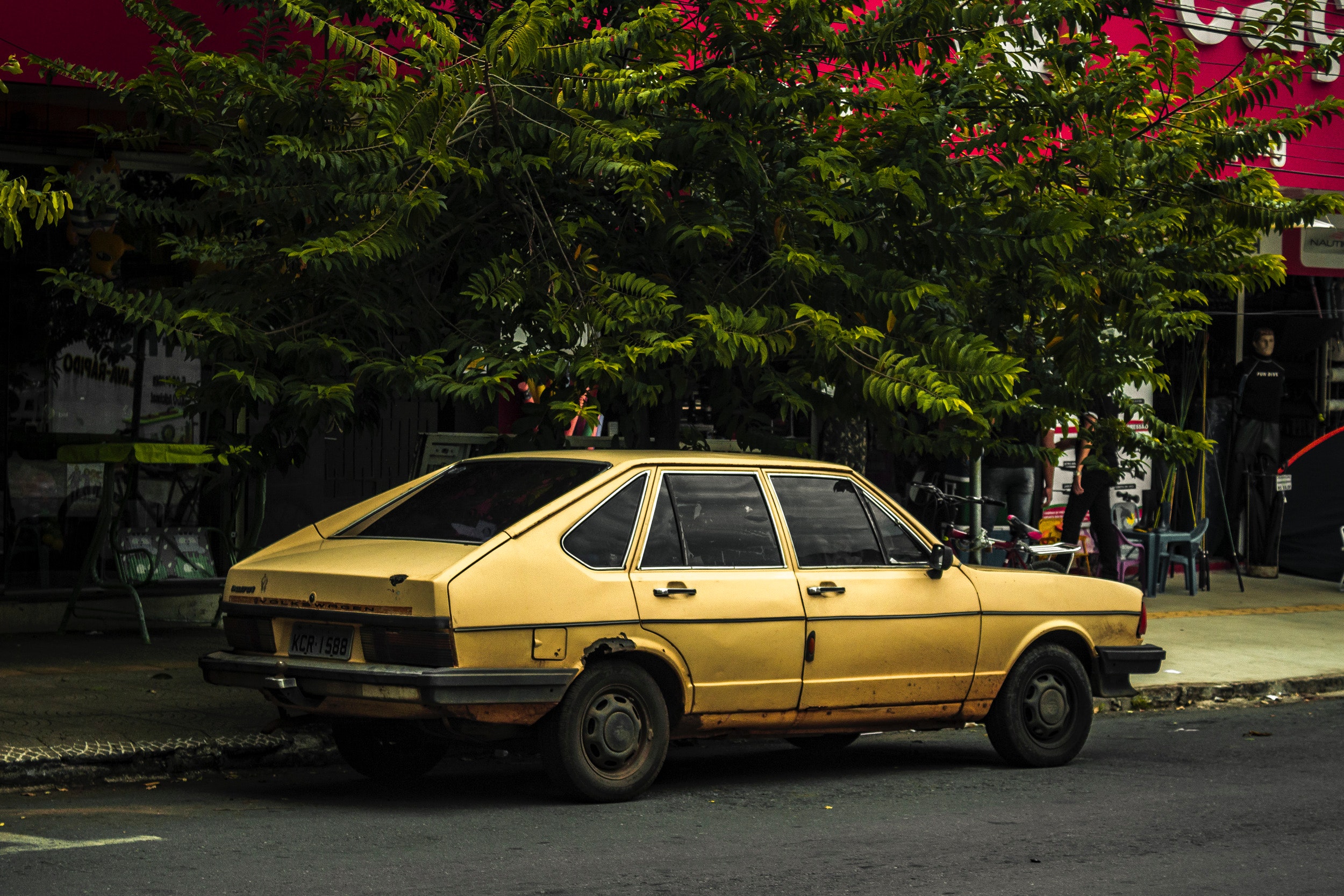 yellow beater car