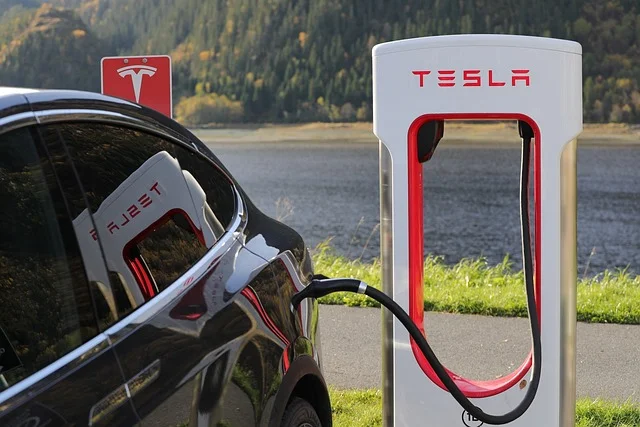 Tesla at a charging station